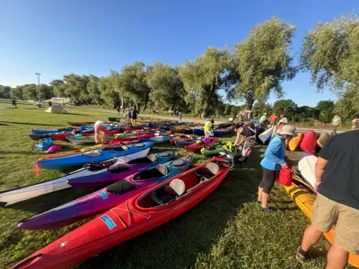 A bunch of Kayaks lined up