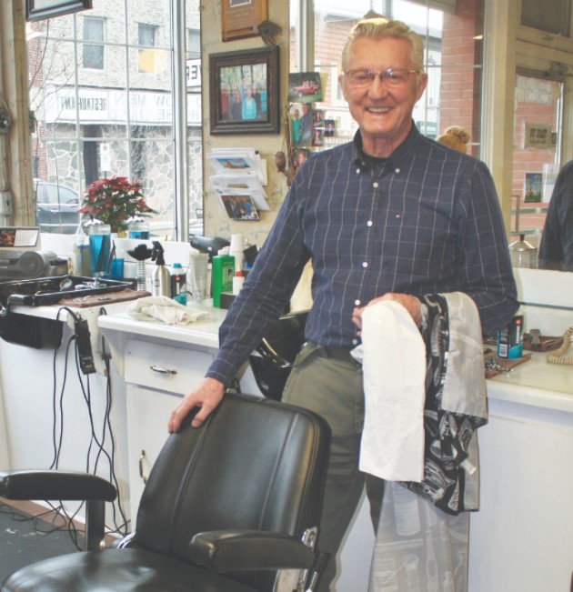Man standing in barber shop