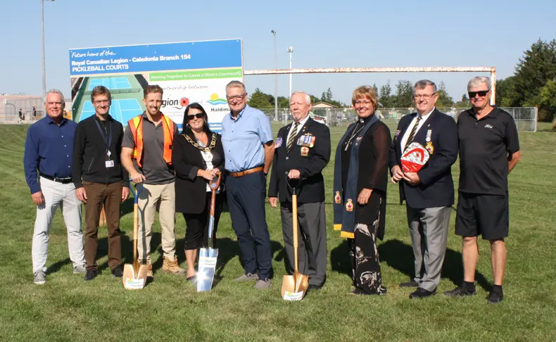Sod turning group picture. Left to right: Scott Luey, Tyson Haedrich, Spencer Garrett, Mayor Shelley Ann Bentley, Councillor Dan Lawrence, Dennis Zebiere, Janice Doyle, Brian Haggith, Ron Winegard