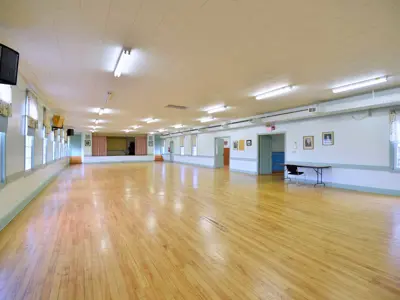 Interior View Of Hall With Stage At Agricultural Centre