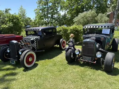 two black classic cars