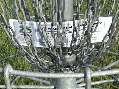 June Silver Ticket hint photo showing a ticket among chains