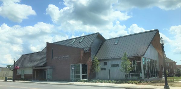 The Cayuga Library and Heritage Centre building with a metal roof and brick exterior.